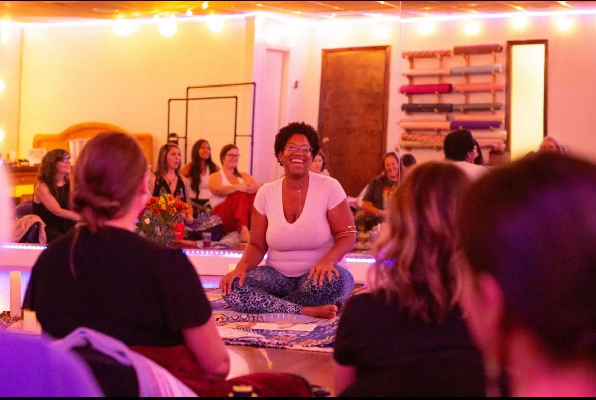 Iana Walker facilitating a group of women